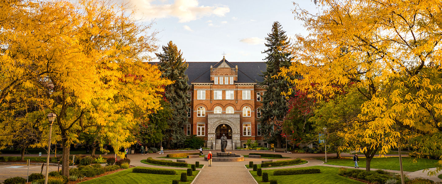 Long shot of College Hall on Gonzaga campus in fall