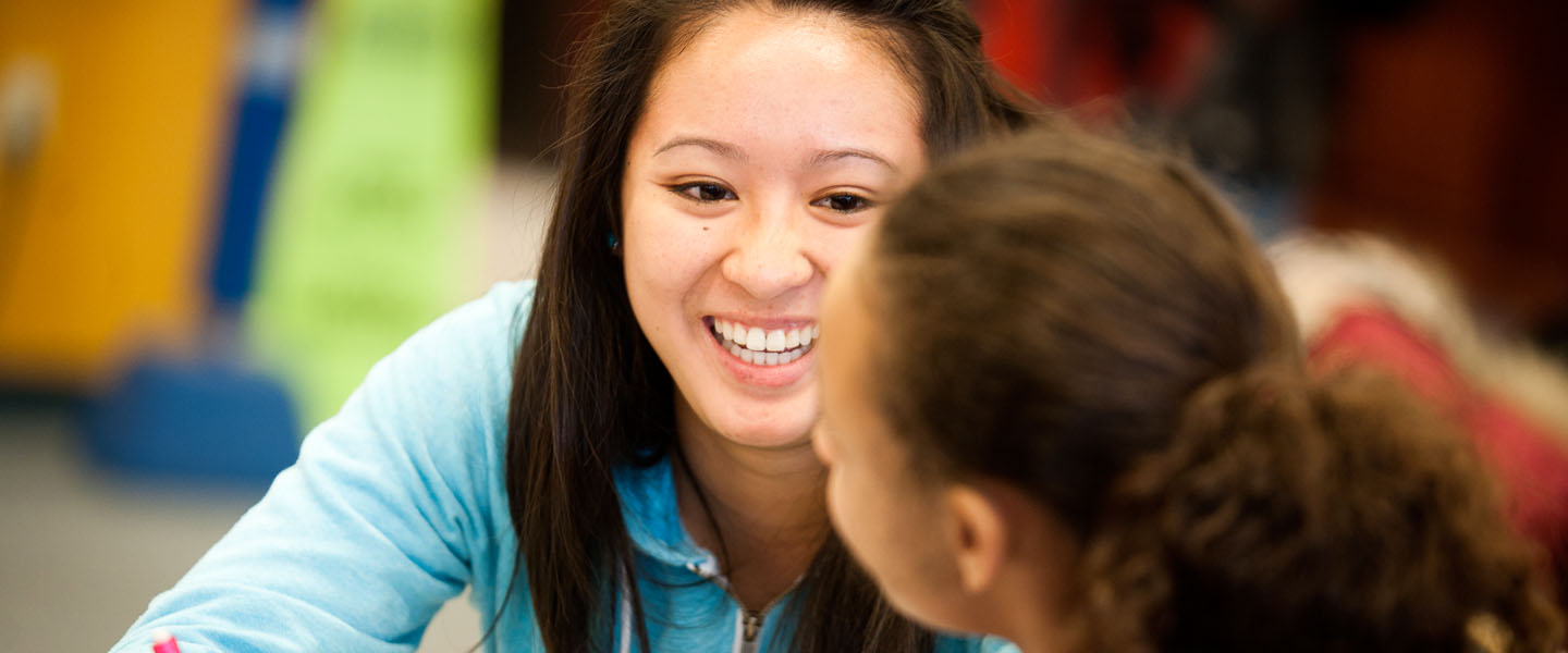 Student tutoring child